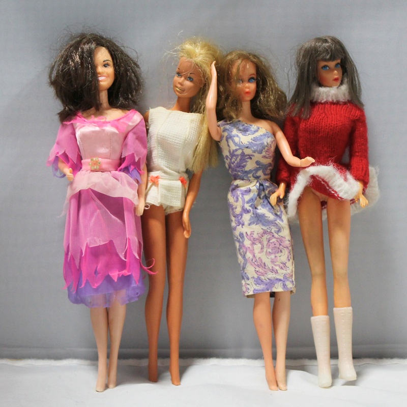 Lot of 4: Twist N Turn Barbies, 3 Korean and 1 Japanese